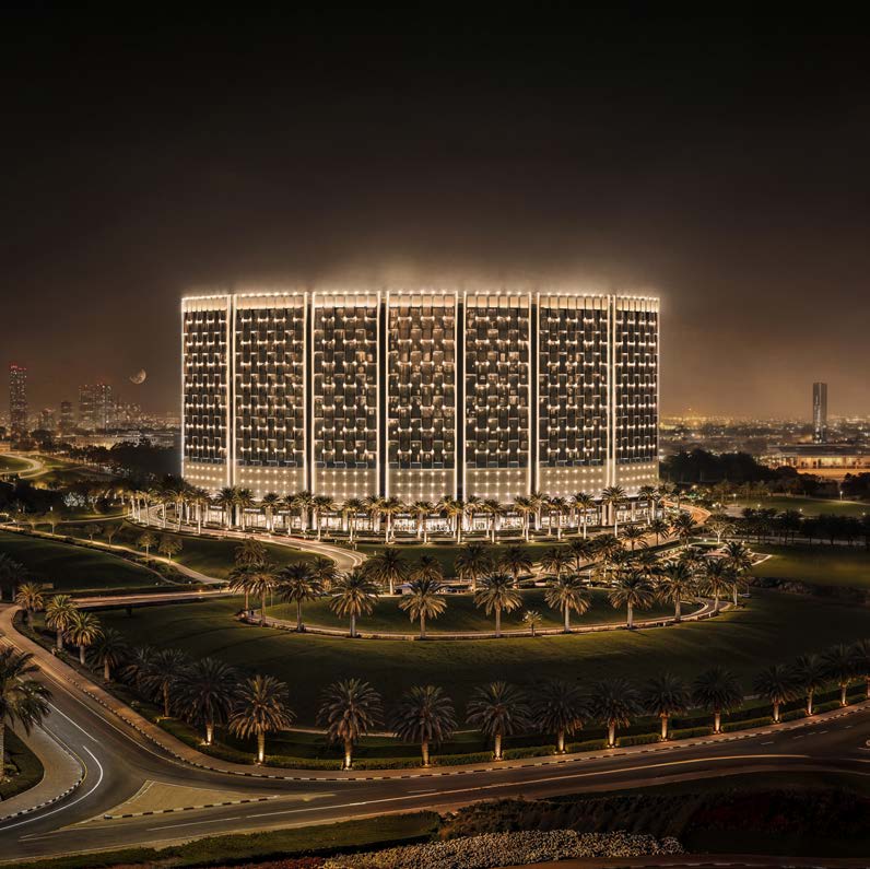 Binghatti Wraith illuminated against the Dubai night skyline